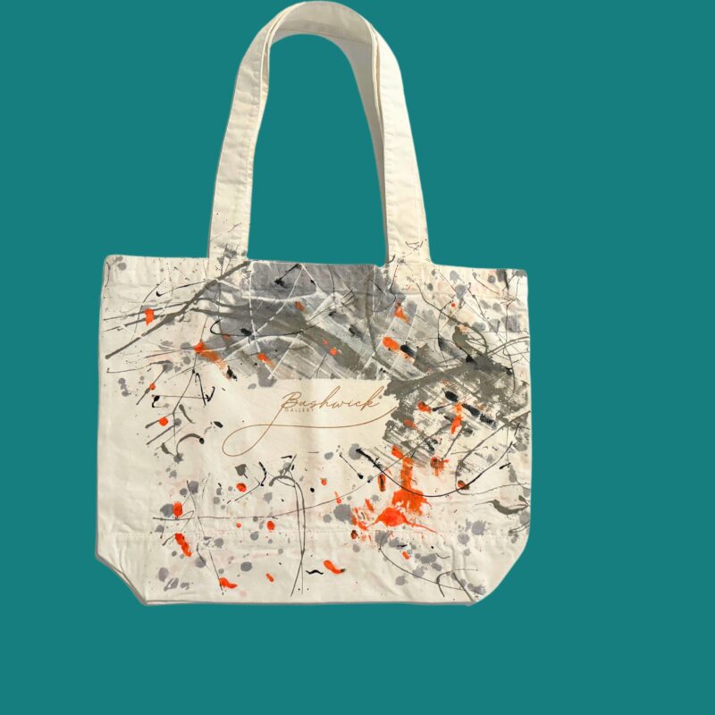 Bushwick Gallery Handmade Tote Bags – Unique, Artistic, and Community-Driven Discover the one-of-a-kind handmade tote bags from Bushwick Gallery, located in the heart of Bushwick, Brooklyn, a vibrant and growing artist community. Each tote is crafted with care, offering you the chance to own a truly unique piece. Choose between a simple plain tote or an exclusive artist-used tote, touched by the hands of artists as they create their masterpieces. No two bags are the same—every artist-used tote carries its own distinct marks from the studio, making it a true work of art. 100% of the profits from these bags go towards supporting artists, helping them display their work at Bushwick Gallery. By purchasing one of these totes, you are directly contributing to an artist’s journey, giving them the platform to share their creations with the world. Product Features: • Handmade & Unique: Every artist tote is individually crafted, making each one one-of-a-kind. • Location: Designed and influenced by the dynamic art scene in Bushwick, Brooklyn, a creative hub where new and established artists thrive. • Size: 18.5" x 15" – spacious and versatile for everyday use. • Material: 100% cotton canvas, durable for a range of uses. • Style Options: Choose between a plain, sleek tote or an artist-used tote with unique studio marks. A Perfect Gift for Art Lovers and Supporters These handmade tote bags make ideal gifts for art lovers, gallery goers, or anyone who wants to feel connected to the art world. When you purchase a Bushwick Gallery tote, you’re doing more than just carrying a bag—you’re supporting the creative spirit of Brooklyn’s thriving artist community. Be part of Bushwick, a place where art comes alive, and creativity knows no bounds. • Handmade tote bags • Artist tote bags • Unique Brooklyn tote bags • Art community tote bag • Bushwick Brooklyn art • Support local artists • One-of-a-kind artist totes • Bushwick Gallery Brooklyn • Brooklyn artist gifts • Tote bags for art lovers Explore Bushwick, Brooklyn’s Art Scene Located in Brooklyn’s cool, up-and-coming Bushwick neighborhood, this community is home to a diverse range of artists who push the boundaries of creativity. With galleries, studios, and art spaces emerging every day, Bushwick is the new heart of New York City’s contemporary art scene. Owning one of these bags connects you to this exciting world and lets you carry a piece of Bushwick’s creative energy with you.